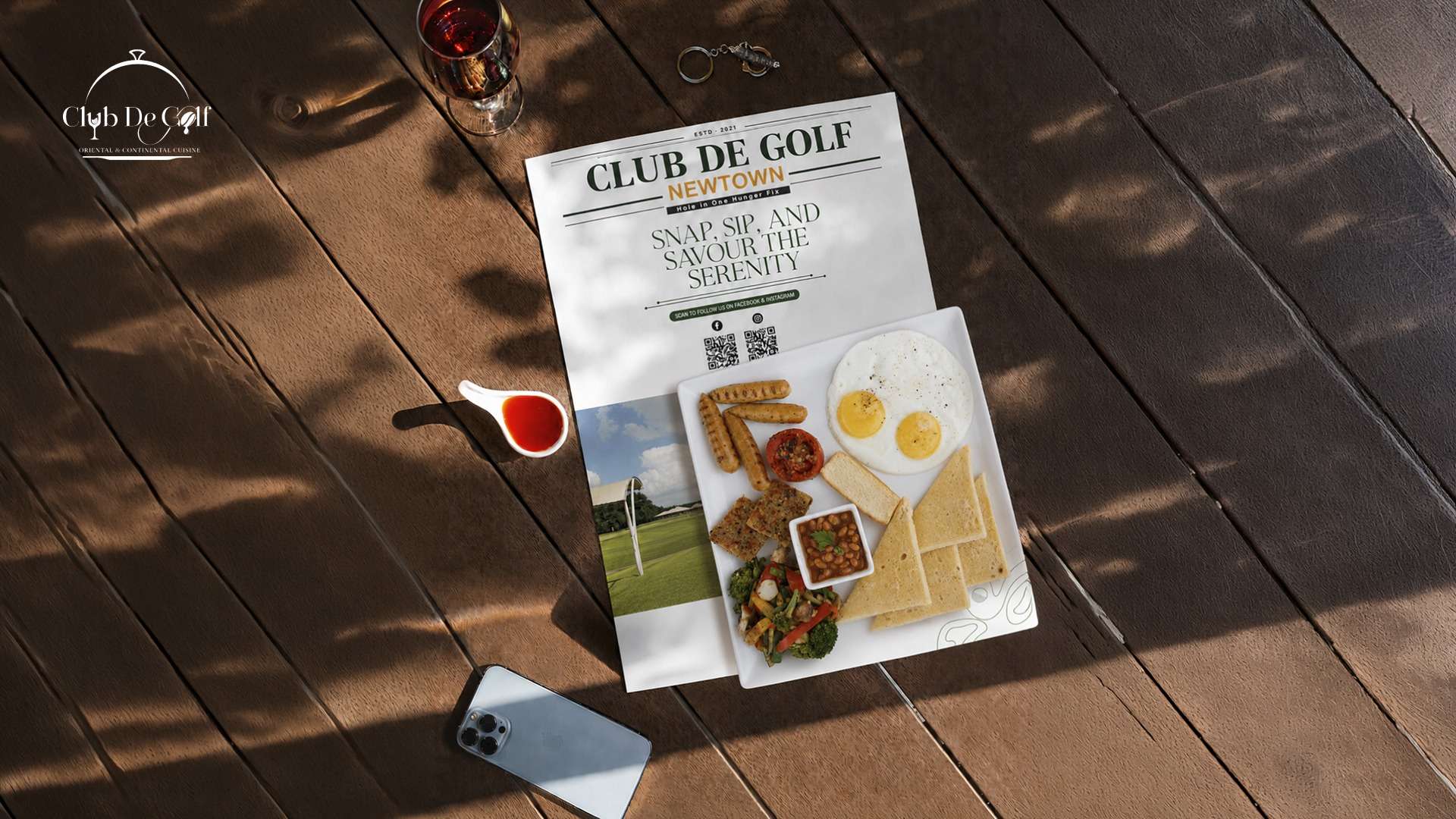 English breakfast platter served on a wooden table at Club De Golf New Town
